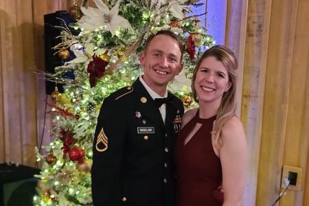 Staff Sgt. Devin Bigelow, pictured with his wife, joined the Army after witnessing classmates killed from gang violence in his hometown Omaha, Nebraska. The combat medic returns to Omaha each year to visit the grave stones of his fallen classmates. 