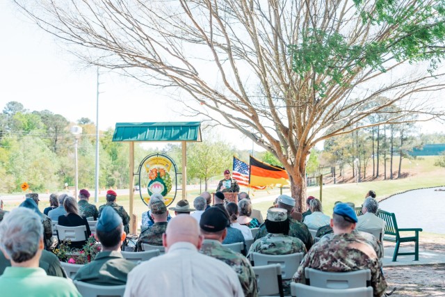 The USSACE German Liaison Officer, Lt. Col. Michael Heger, speaks to a crowd at Johnny Henderson Park in Enterprise, Ala. during the ceremony on March 28. 