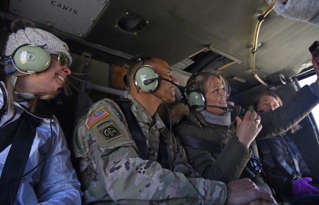 Maj. Gen. Robert Edmonson, commanding general of U.S. Army Communications-Electronics Command and Aberdeen Proving Ground senior commander, poses for a selfie with educators from the local community while flying on a Blackhawk helicopter during...