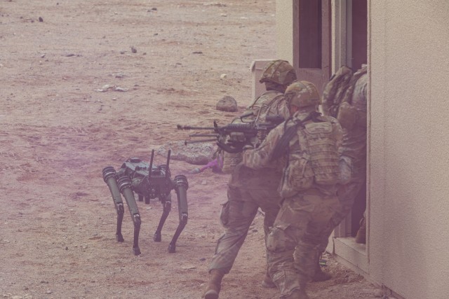 A Quadruped Ghost robotic dog is deployed as part of an urban assault during a series of Human Machine Integration experiments in a training environment as part of Project Convergence – Capstone 4 at Fort Irwin, Calif., March 18, 2024. 