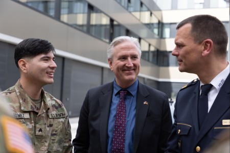 From left, U.S. Army Sgt. Nicolas Gomez, U.S. Consul David T. Panetti, and Police President Dirk Lichtenberger speak following a recognition ceremony at the Zwickau Police headquarters in Zwickau, Germany, March 27, 2024. Gomez...