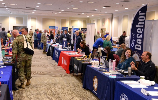 Career and Education Fair attendees talk with vendors April 2, 2024, at the Frontier Conference Center at Fort Leavenworth, Kan. Photo by Prudence Siebert/Fort Leavenworth Lamp