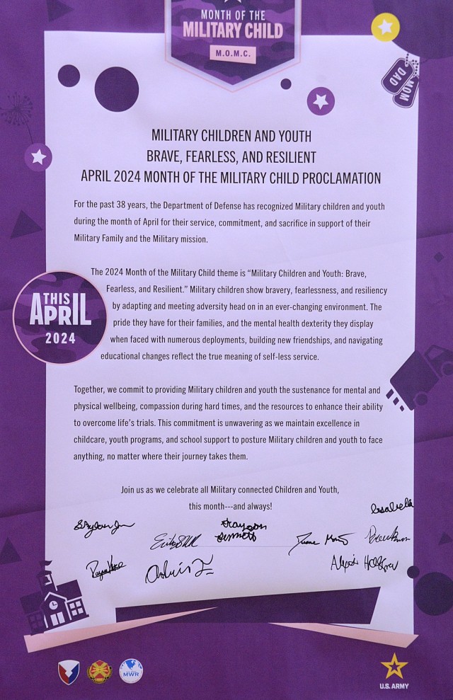 Fort Leavenworth, Kan., Garrison Commander Col. Duane Mosier and Garrison Command Sgt. Maj. Erika Rhine-Russell signed the 2024 Month of the Military Child proclamation during a MOMC kick-off assembly April 1, 2024, at Harrold Youth Center at Fort...
