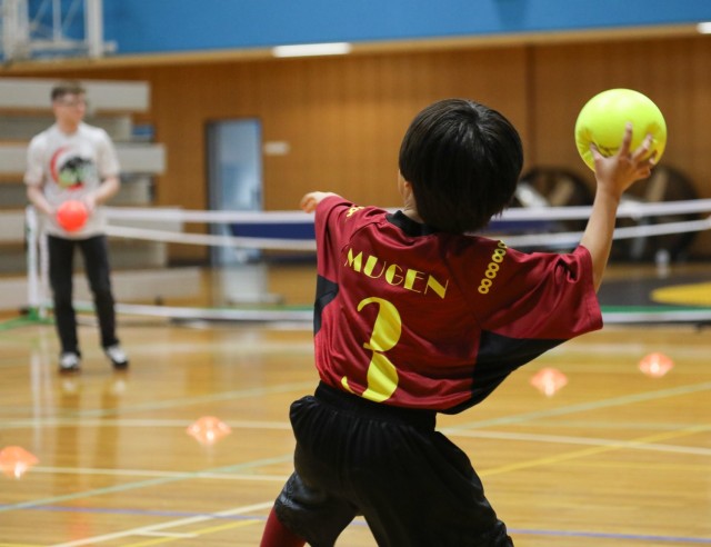 Community members participate in a dodgeball game with children from the Sagamihara Minami Children’s Home during an outreach event at Camp Zama, Japan, April 3, 2024. 
