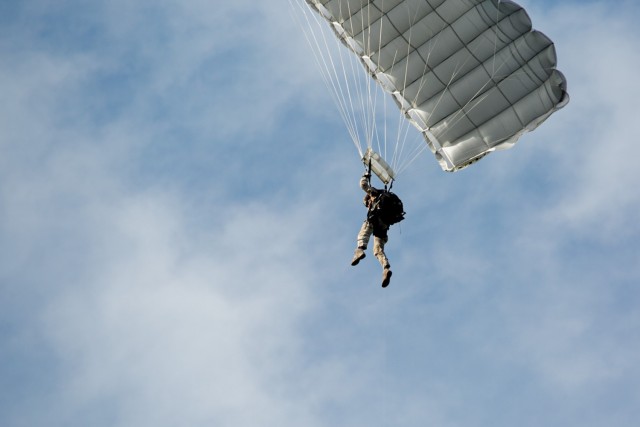 A Greek special operations forces (SOF) soldier prepares to land at Megara drop zone during a joint military free fall jump with 10th Special Forces Group (Airborne) near Nea Peramos, Greece, March 5, 2024. This jump strengthened the partnership...