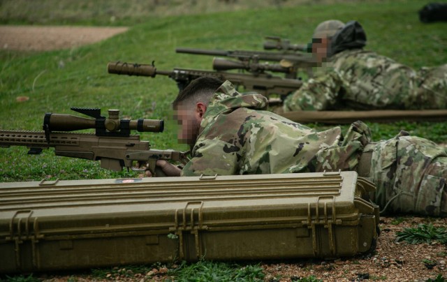 A Greek special operations soldier shoots the M110 Semi-Automatic Sniper System at a joint force weapons range with 10th Special Forces Group (Airborne) near Nea Peramos, Greece, March 1, 2024. This range operation helped build rapport among 10th...