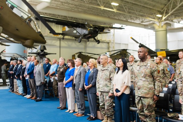Fort Novosel and Enterprise leaders stand during the IGSA signing ceremony at the Army Aviation Museum on April 8 on Fort Novosel.