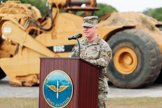 Maj. Gen. Michael C. McCurry, U.S. Army Aviation Center of Excellence and Fort Novosel commanding general, speaks to the crowd at the groundbreaking ceremony for the AIT barracks complex project on April 10, 2024. 