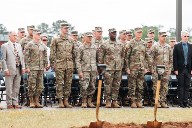 Fort Novosel leaders stand at attention during the groundbreaking ceremony for the AIT barracks complex on April 10, 2024. 