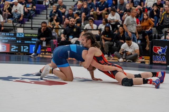 Sgt. Areana Villaescusa takes down an opponent during the 2023 World Team Trials Challenge, in Colorado Springs, Colorado, May, 2023. Photo by Staff Sgt. Michael Hunnisett.