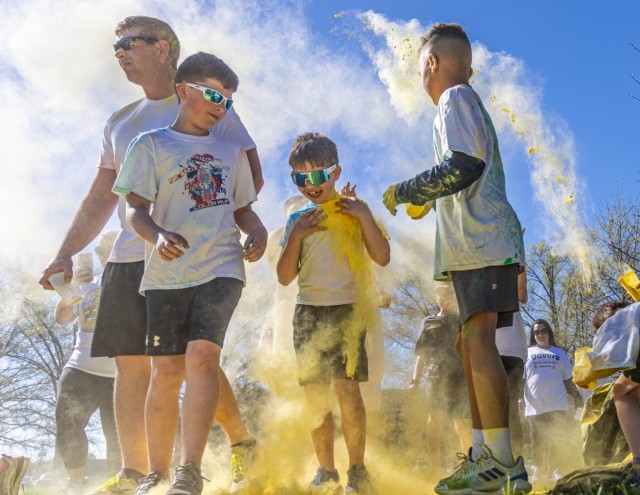 Fort Knox Family and Morale, Welfare and Recreation hosts the 2024 Month of the Military Child Color Run at Fort Knox, Kentucky April 13. More than 600 people participated. Event organizers provided bananas and water along the route to keep runners hydrated and energized.