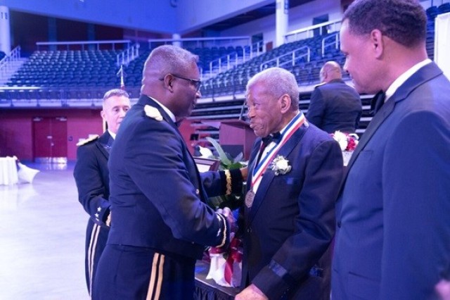 From left are Lt. Gen. Robert Rasch Jr., commander of the Rapid Capabilities and Critical Technologies Office; retired Maj. Gen. Patrick Burden, president of the Bulldog Brigade of Military Alumni; 2024 BBMA Hall of Fame inductee, retired Col....