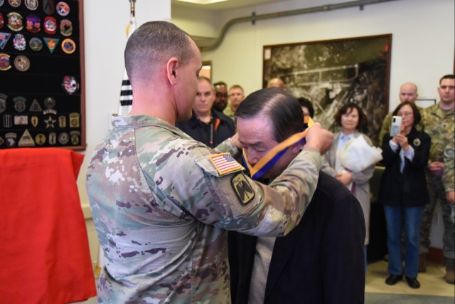 Air traffic controller at Humphreys recognized with Order of Saint Michael