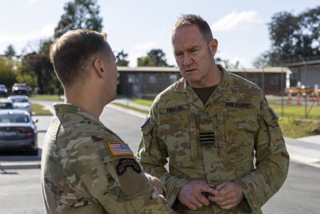 Wing Commander Michael Krause talks with Lieutenant Colonel Jon Peterson, United States Army during the Talisman Sabre 2025 Concept Development Conference.