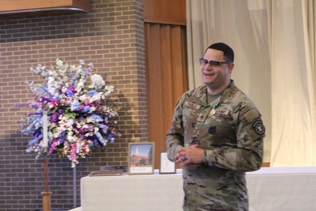 Staff Sgt. Jorge Padilla, the funds and operations NCO for the Religious Support Office, speaks April 12 at his awards ceremony and farewell at Bicentennial Chapel. “This is an amazing city,” he said of Huntsville. “Amazing installation. Good people.”

