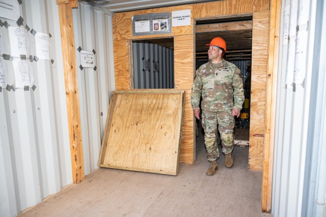 U.S. Army Training and Doctrine Command’s Command Sgt. Maj. Raymond Harris tours the Homeland Defense Civil Support Urban Search and Rescue training area April 17 during his visit to Fort Leonard Wood. 