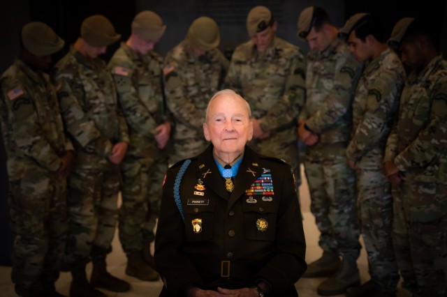 Retired Col. Ralph Puckett Jr., Medal of Honor recipient, poses with members of the 75th Ranger Regiment at the National Infantry Museum in Columbus, Ga. on Aug. 10, 2021.