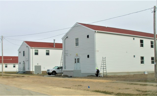 Reset of World War II-era barracks moved in 2023 continues; work nearly complete