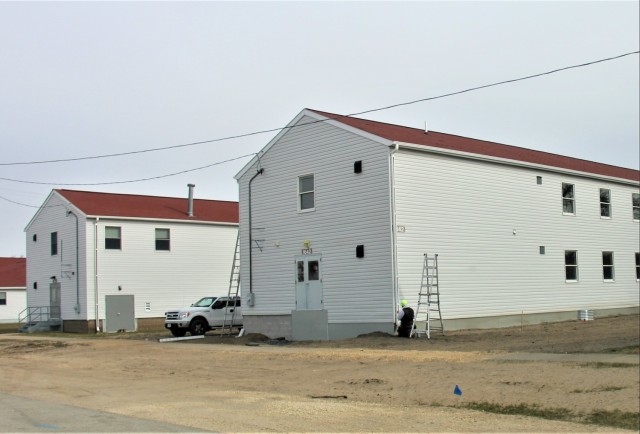 Reset of World War II-era barracks moved in 2023 continues; work nearly complete