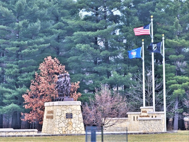 Raising flag at Fort McCoy&#39;s Veterans Memorial Plaza