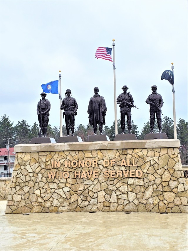 Raising flag at Fort McCoy&#39;s Veterans Memorial Plaza