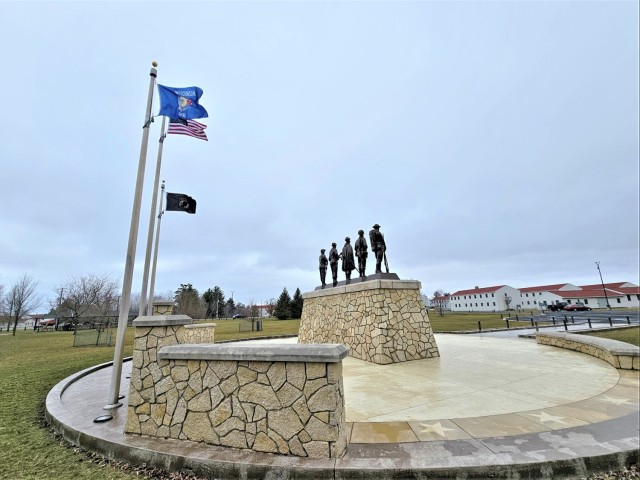 Raising flag at Fort McCoy&#39;s Veterans Memorial Plaza