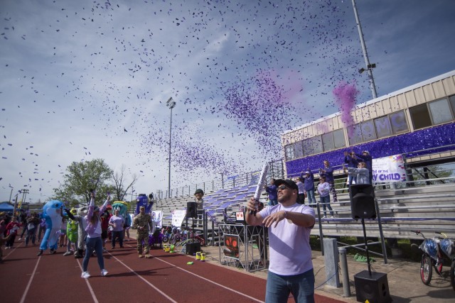 In celebration of Month of the Military Child, Fort Leonard Wood garrison leaders, employees from the Directorate of Family and Morale, Welfare and Recreation, and members of the Fort Leonard Wood community officially kick off MOMC-palooza April...