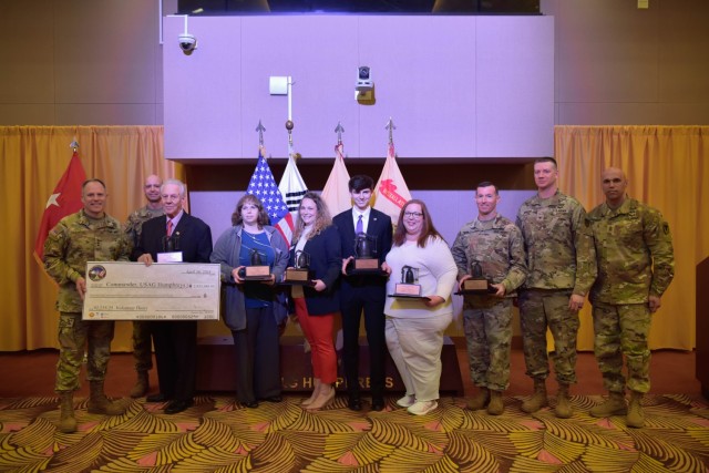 2024 Volunteer of the Year winners join Eighth Army and U.S. Army Garrison Humphreys command leadership for a group photo on April 16, 2024, at the Morning Calm Center, Camp Humphreys, South Korea. The selfless service and dedication of USAG...