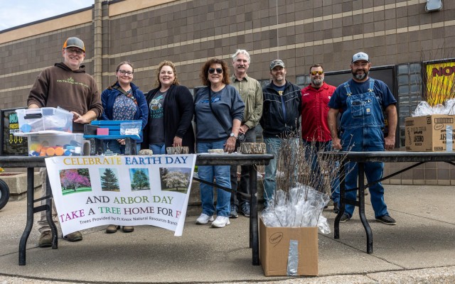 Members of the Natural Resources Branch hand out tree seedlings in honor of Arbor Day at Fort Knox, Kentucky April 26, 2024. All three options handed out, white flowering dogwood, Eastern redbud and Shumard Red Oak, are native trees to Kentucky....