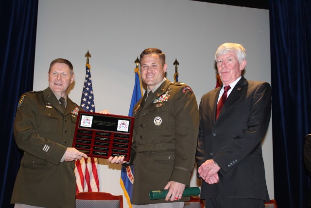 From left are commencement speaker Brig. Gen. Stephen Case, deputy commander for operations, 88th Readiness Division at Fort Snelling, Minn.; distinguished honor graduate Maj. Alex Ford, the space officer for 75th Ranger Regiment at Fort Moore,...