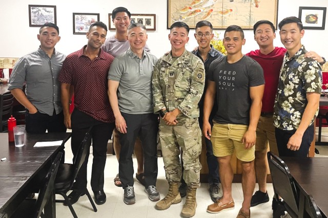 Members of the Fort Liberty Asian and Pacific Islander Army Officers group pose for a photo with Brig. Gen. Michael B. Siegl, center left, following a mentorship session in September 2023. The group has grown to nearly 2,000 members stationed around the globe.