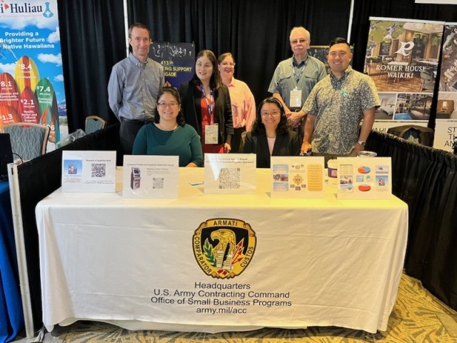 The 413th CSB Deputy Ms. Sharon Oishi and contracting personnel from RCO-HI and RCO-AK guide small businesses on how to do business with the Army at the 413th CSB booth. 
