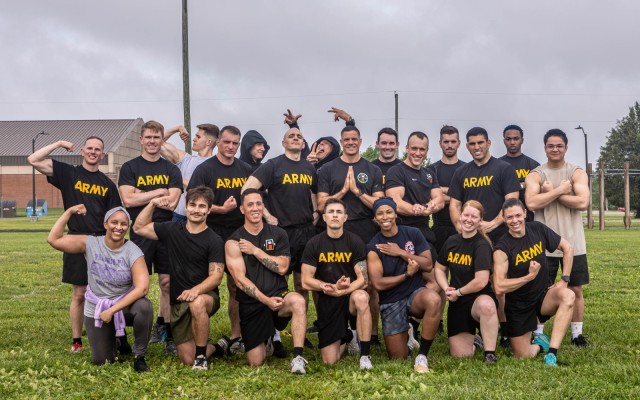 21 ACFT Challenge participants pose for a group photo following the event at Fort Knox, Kentucky April 30, 2024. The event was open to everyone and had participants from the Army, Airforce and civilian participants.