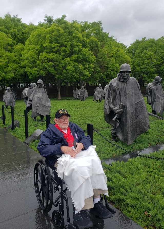 Charles Bishop sits alongside the Korean War Veterans Memorial April 27 in Washington, D.C. Bishop, a Marine, who fought in the Korean War, visited the nation’s capital with his daughter, Lisa Shattuck, a Fort Leonard Wood Security Specialist with the Directorate of Plans, Training, Mobilization and Security, as part of a one-day honor flight tour hosted by a non-profit organization for veterans. 