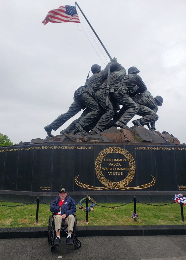 Charles Bishop sits alongside the Marine Corps War Memorial April 27 in Washington, D.C. Bishop, a Marine, who fought in the Korean War, visited the nation’s capital with his daughter, Lisa Shattuck, a Fort Leonard Wood Security Specialist with the Directorate of Plans, Training, Mobilization and Security, as part of a one-day honor flight tour hosted by a non-profit organization for veterans.