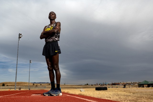 Army Staff Sgt. Leonard Korir of the Army World Class Athlete Program and 2016 Olympian stands for a photo on a running track at Fort Carson, Colo. March 11, 2024.