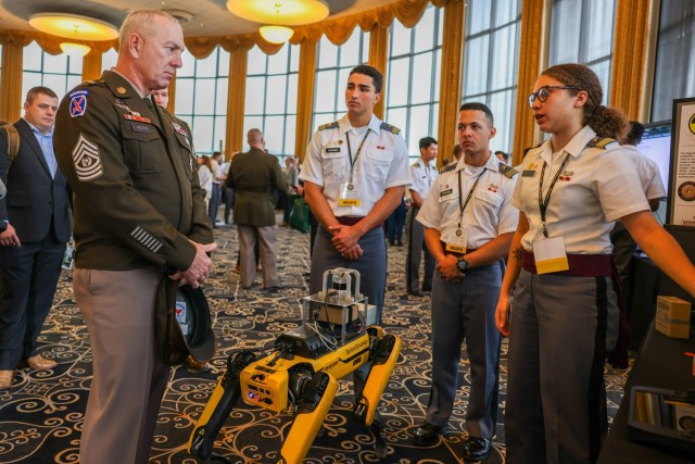 Command Sgt. Maj. Brian Hester, Army Futures Command receives a cadet briefings during the United States Military Academy’s annual Projects Day Research Symposium at West Point, N.Y. on May 2, 2024. This year’s symposium had over 450 projects presented in varying stages of development on topics ranging from rocketry to artificial intelligence. 