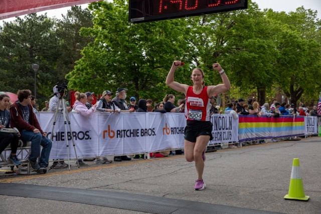 Puerto Rico National Guard runner Sgt. Angeles Virella crosses the finish line of the 47th annual Lincoln Marathon and Half Marathon May 5, 2024, in Lincoln, Nebraska. The Nebraska National Guard has a long history of supporting the Lincoln...