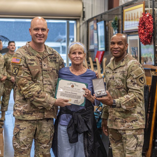 Volunteers for the Fort Knox American Red Cross Helping Hands Program are awarded commendation medals for their hours of service at Fort Knox, Kentucky, on May 7, 2024. The Garrison Command team visited the organization’s Warrior Warehouse...