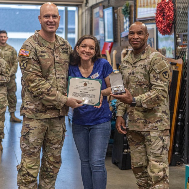 Volunteers for the Fort Knox American Red Cross Helping Hands Program are awarded commendation medals for their hours of service at Fort Knox, Kentucky, on May 7, 2024. The Garrison Command team visited the organization’s Warrior Warehouse...
