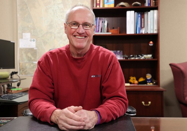 Dan Musel, chief of Environmental Management Division at Fort Knox, Kentucky, sits at his desk Feb. 9, 2024.