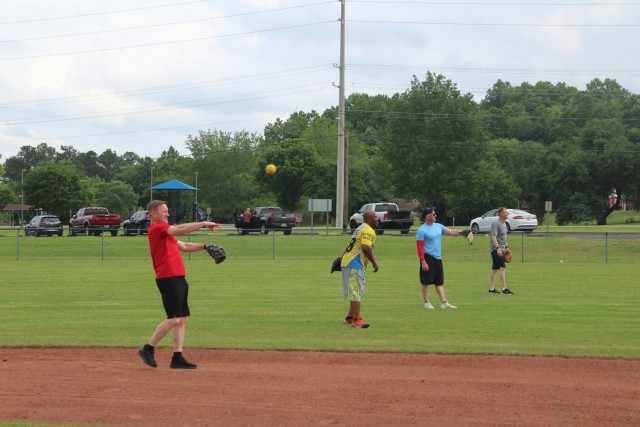 Warming up for Team Redstone’s first practice May 7, from left, are Garrison Commander Col. Brian Cozine, retired Marine Master Sgt. Ty Butler, retired Sgt. 1st Class Chris Tilley and Garrison Command Sgt. Maj. Dylan Lemasters.