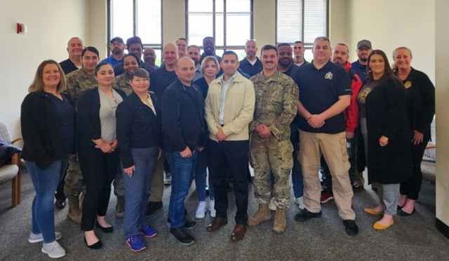 Students pose for a photo after graduating the crisis intervention team training at the U.S. Army Military Police School in Fort Leonard Wood, Missouri, May 7, 2024. The five-day course, conducted in collaboration with the Missouri Crisis...