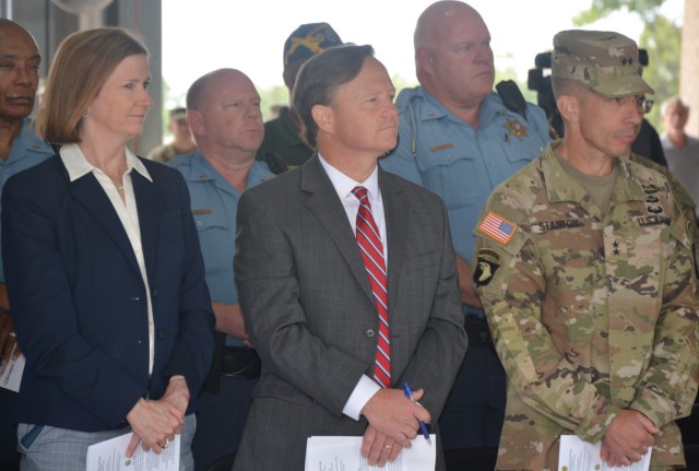 The Honorable Brian K. Epps, Federal Magistrate Judge, Southern District of Georgia, and Maj. Gen. Paul T. Stanton, commanding general, U.S. Army Cyber Center of Excellence and Fort Eisenhower, stand with partners from the Richmond County...