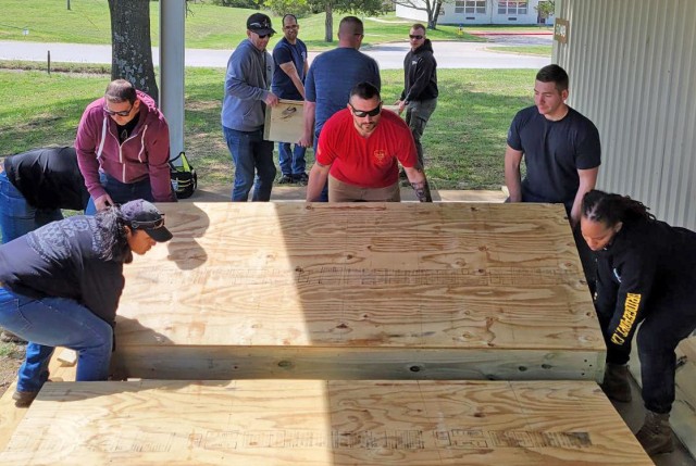 Nearly 20 Soldiers attending the U.S. Army Engineer School’s 120A Warrant Officer Basic Course had the chance to build a new, portable stage for Plato High School, in Plato, Missouri, complete with accessibility ramps, as a volunteer class...