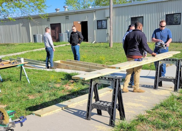 Nearly 20 Soldiers attending the U.S. Army Engineer School’s 120A Warrant Officer Basic Course had the chance to build a new, portable stage for Plato High School, in Plato, Missouri, complete with accessibility ramps, as a volunteer class...