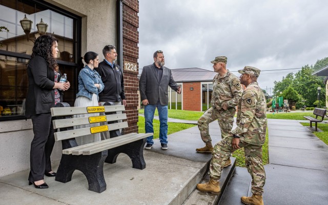 Members of the Environmental Management Division present the Alcohol and Substance Abuse Prevention Prpgram a Buddy Bench at Fort Knox, Kentucky May 17, 2024. The bench was placed in front of the Suicide Prevention Program Coordinator's office to...