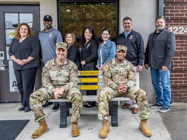 Members of the Environmental Management Division present the Alcohol and Substance Abuse Prevention Prpgram a Buddy Bench at Fort Knox, Kentucky May 17, 2024. The bench was placed in front of the Suicide Prevention Program Coordinator's office to...