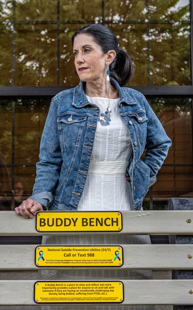 Members of the Environmental Management Division present the Alcohol and Substance Abuse Prevention Prpgram a Buddy Bench at Fort Knox, Kentucky May 17, 2024. The bench was placed in front of the Suicide Prevention Program Coordinator's office to...