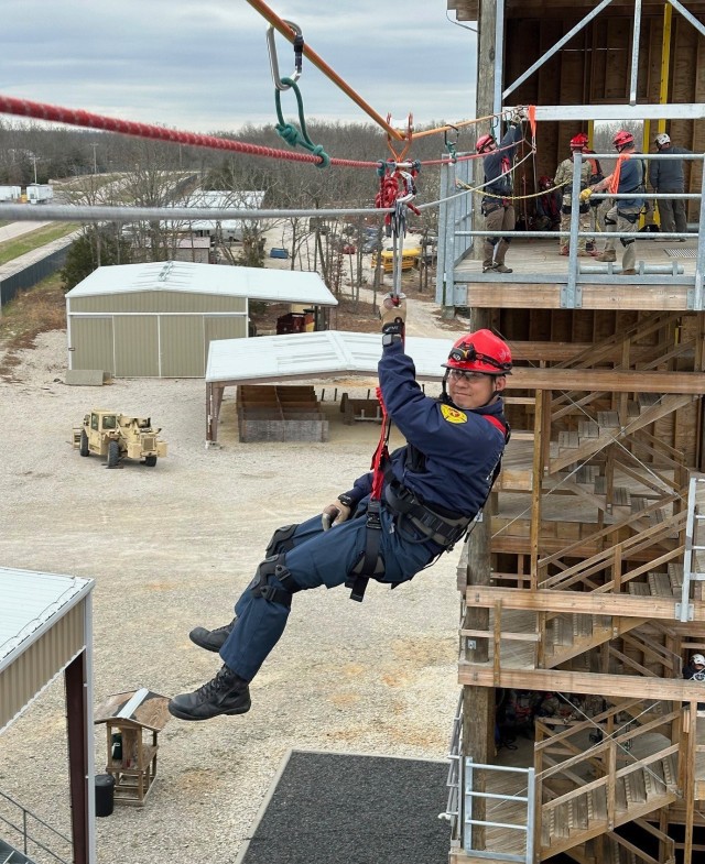 Assistant Chief Masahiro Watanabe, who works for U.S. Army Garrison Japan, conducts a rope exercise during an urban search and rescue course at Fort Leonard Wood, Mo. Watanabe and Capt. Takanori Saito, a fire crew chief for USAG Japan, became the...